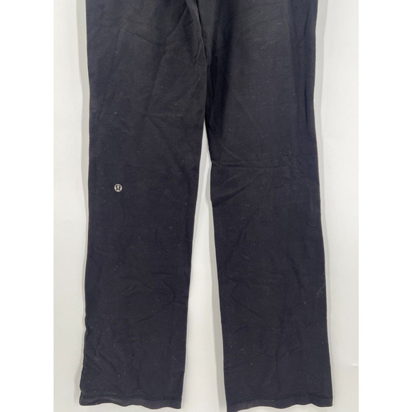 Lululemon Astro Yoga Pants Black/Green Criss Cross Waist Flare Leg Womens Size 4 - Picture 2 of 3